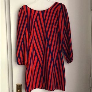 Patterned dress with low V in back